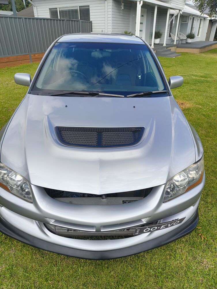 Front from a high angle — bonnet vent and heat extractors visible