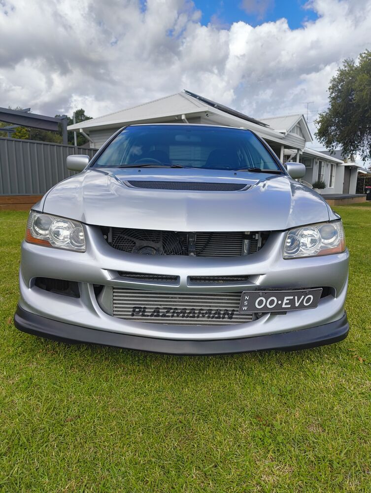 Front, lower angle with broken cloud above